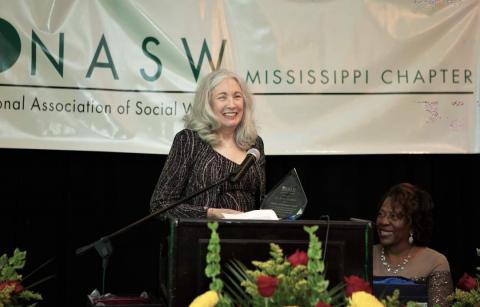 Dr. Crudden Receiving Award